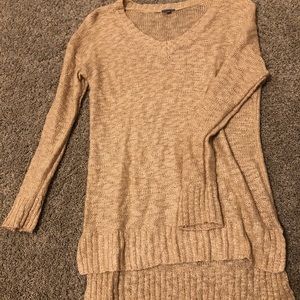 Long sleeves. Long back shorter front. Barley worn